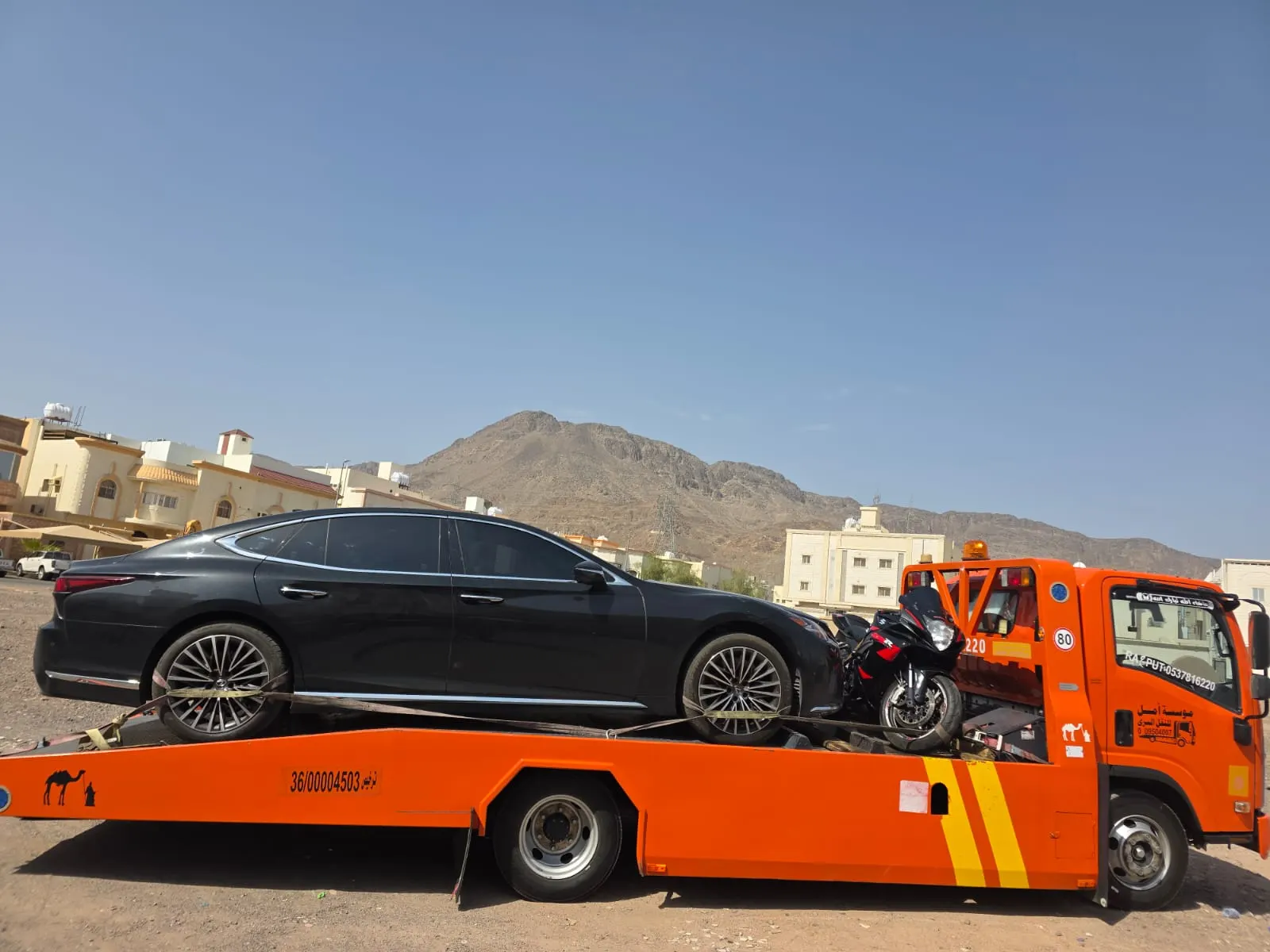 سطحة بين المدن — نقل سيارة ودراجة نارية بأمان